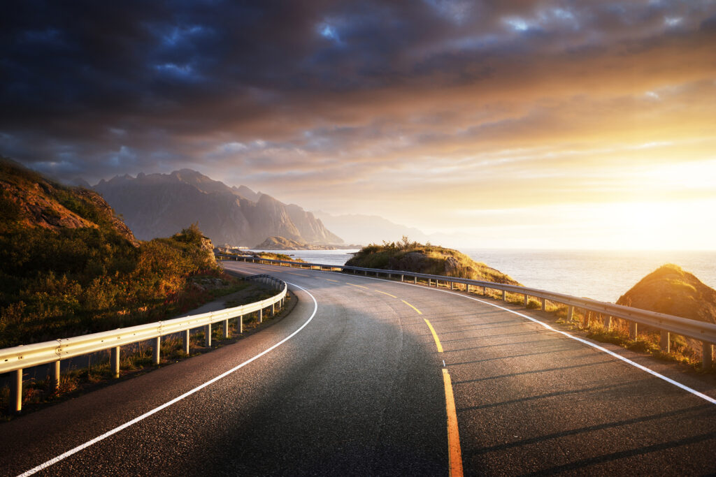 Tarmac Road with sunset coast